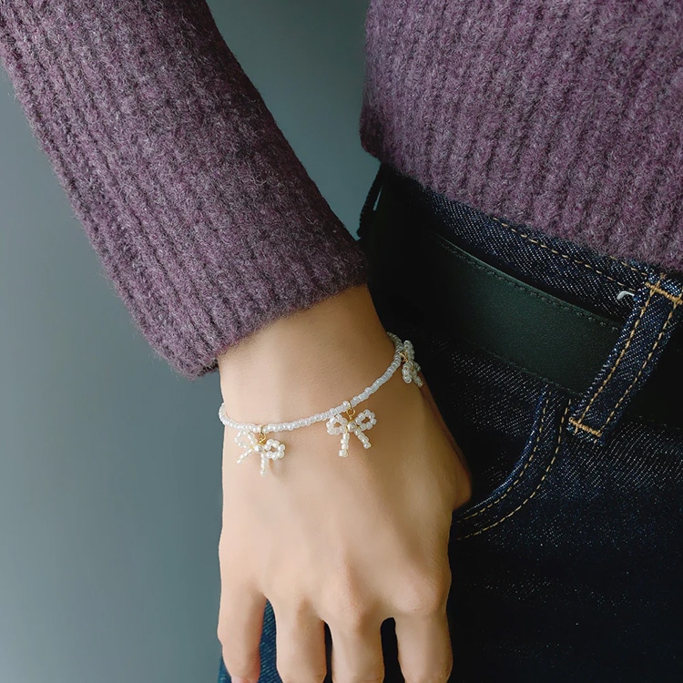 NOJESSパールビーズブレスレット型時計 別売りリボン型チャーム付き NOJESSパールビーズブレスレット型時計 別売りリボン型チャーム付き